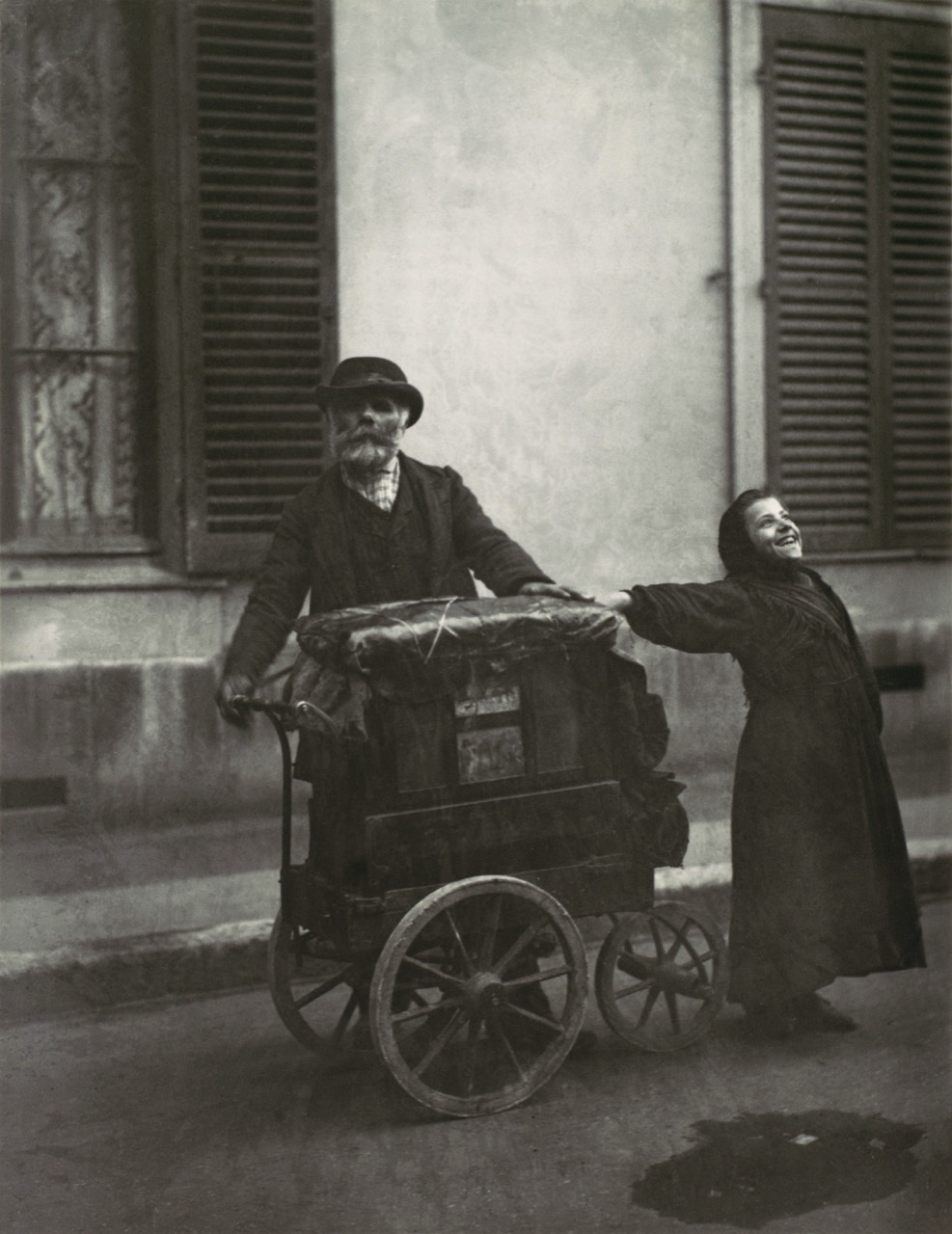 Street Musicians af Eugène Atget